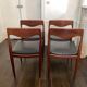Set of 4 vintage designer chairs in teak and black skai 60's