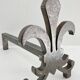 Pair of vintage steel fleur-de-lys andirons