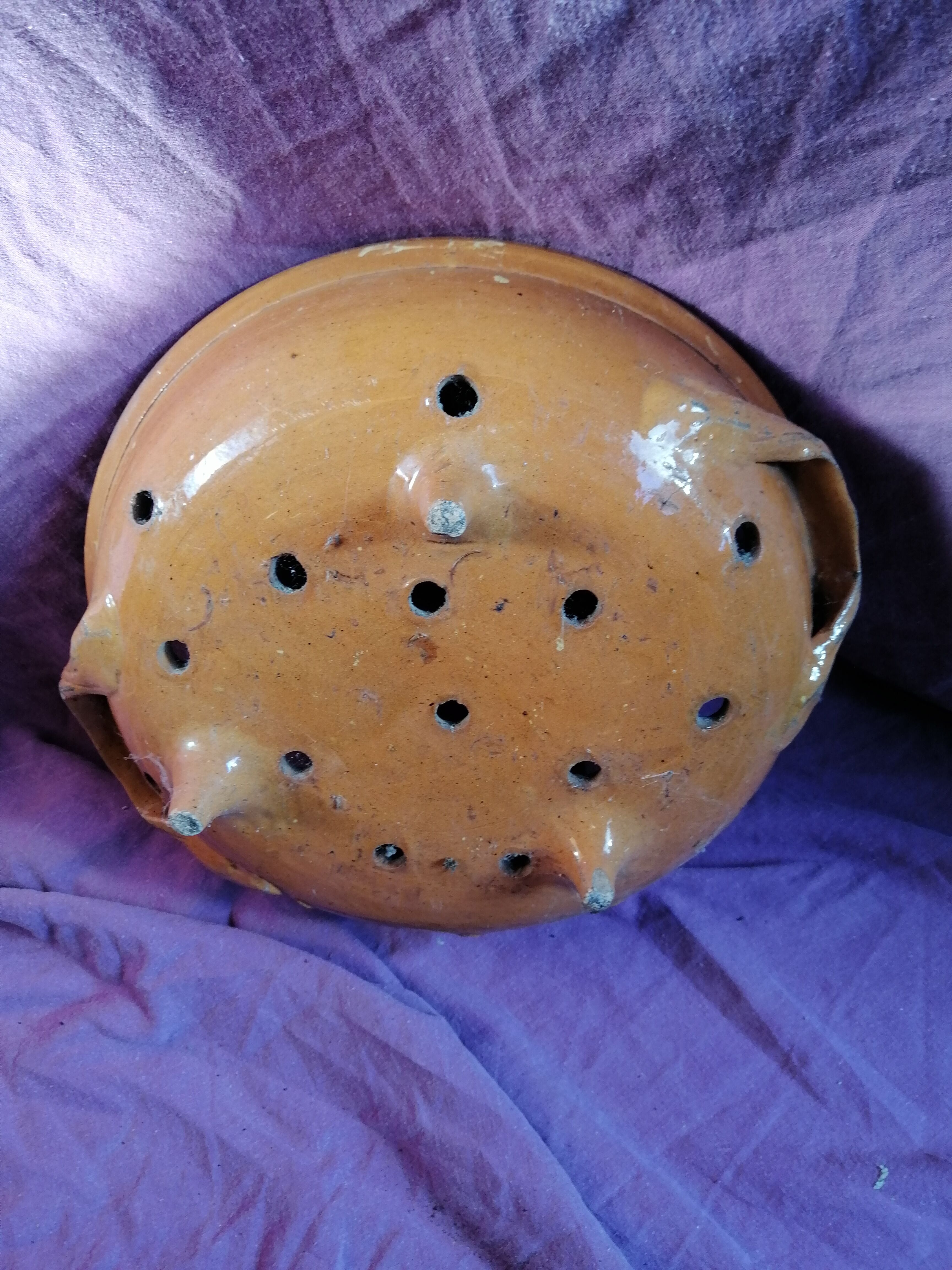 Old dish drainer in mud