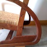 Pair of Art Deco woven rattan armchairs and table