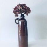 Ancient bottle with handle