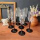 7 Luminarc Domino flutes, black opal tempered vintage glass.
