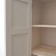 Small antique wardrobe patinated in beige and yellow.