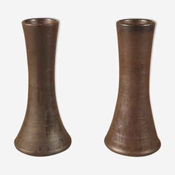 Two sandstone candle holders