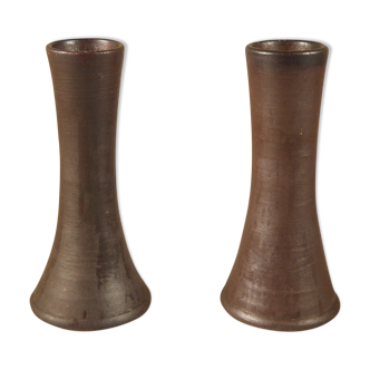 Two sandstone candle holders