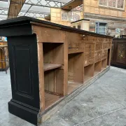 Immense bar counter covered with blue stone.