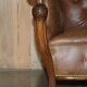 Chesterfield Regency 1810 antique canapé restored in leather with a carved frame.