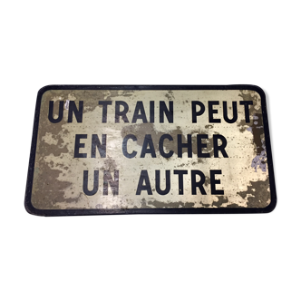Vintage SNCF plate "one train can hide another"