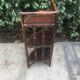 Rattan corner shelf