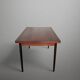 Scandinavian extendable dining table in teak