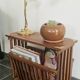 Rosewood and brass magazine stand table