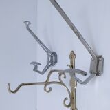 Three brass, chrome, aluminum hooks, early 20th century
