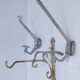 Three brass, chrome, aluminum hooks, early 20th century