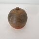Ceramic soliflore vase in the shape of a ball signed GH GII (Signature to be identified)