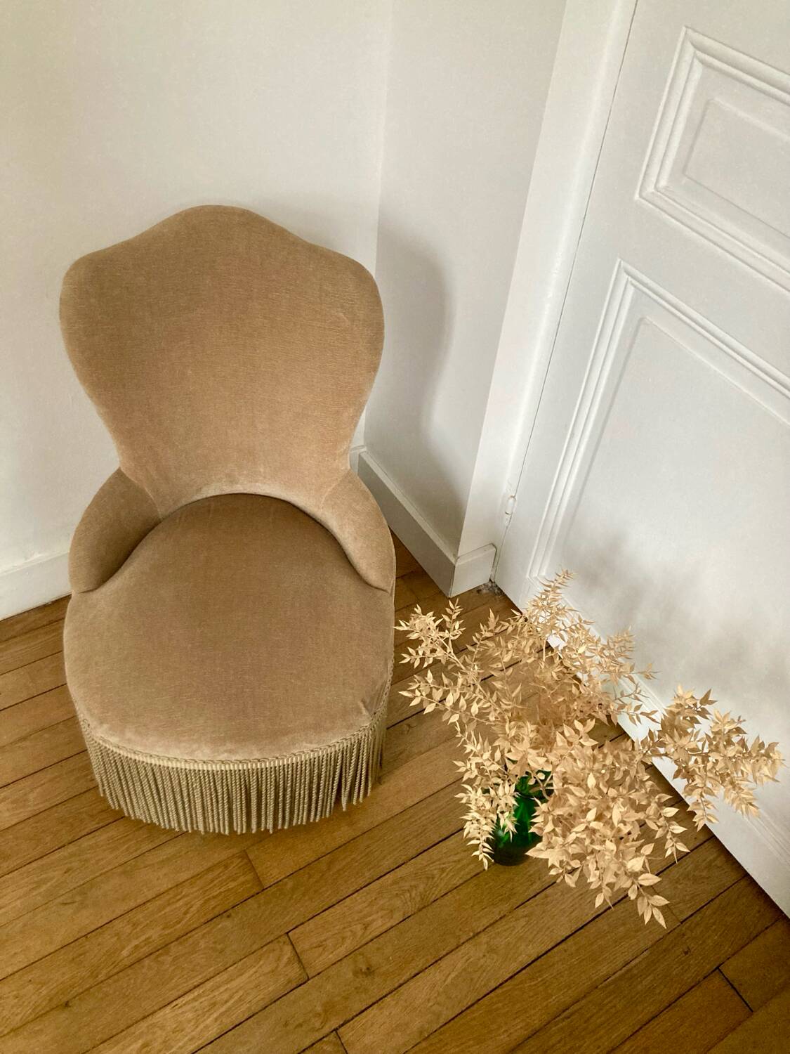 Beige velvet armchair