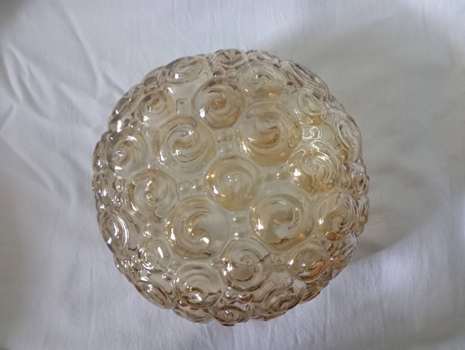 Héléna Tynell snail ceiling / wall light, iridescent amber 1960