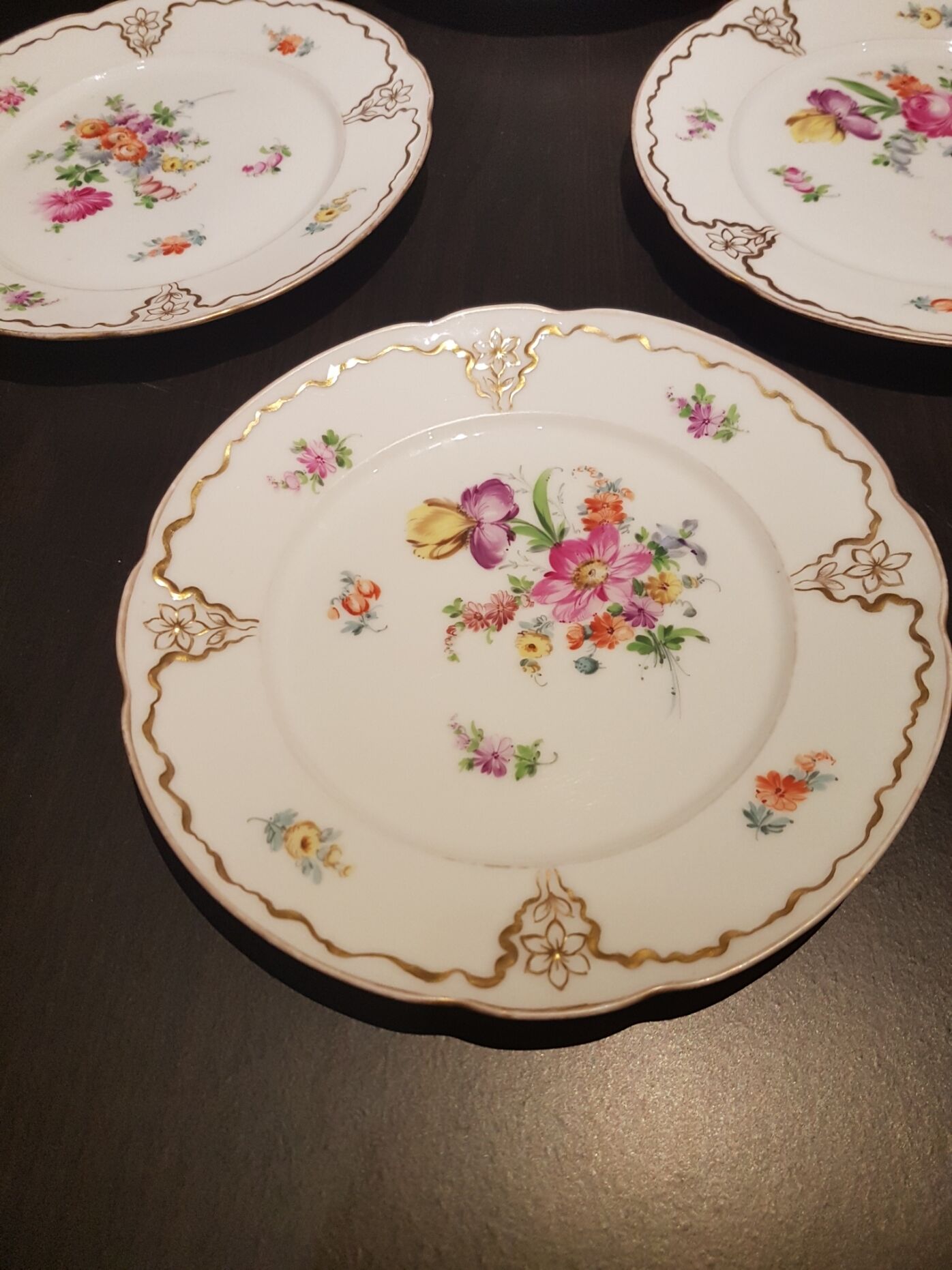 Series of four Dresden porcelain plates