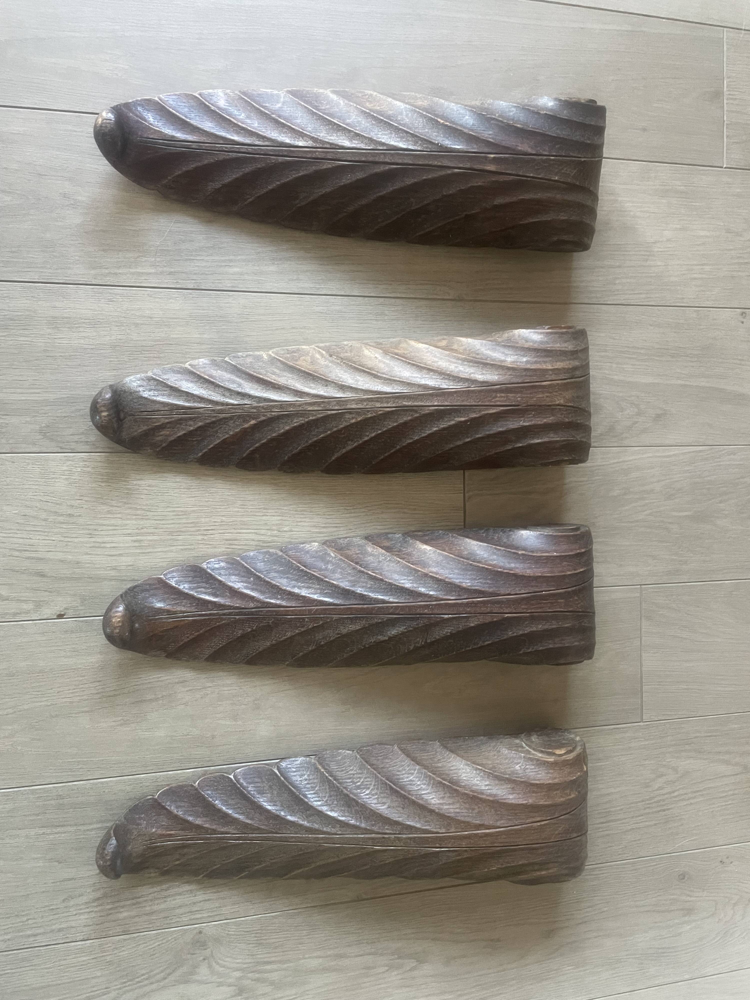four decorative carved wooden objects