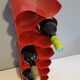 Pair of red metal bottle holders from the 80s