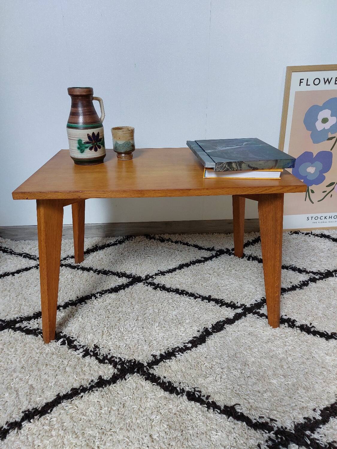 Coffee table with wooden compass legs