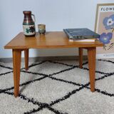 Coffee table with wooden compass legs