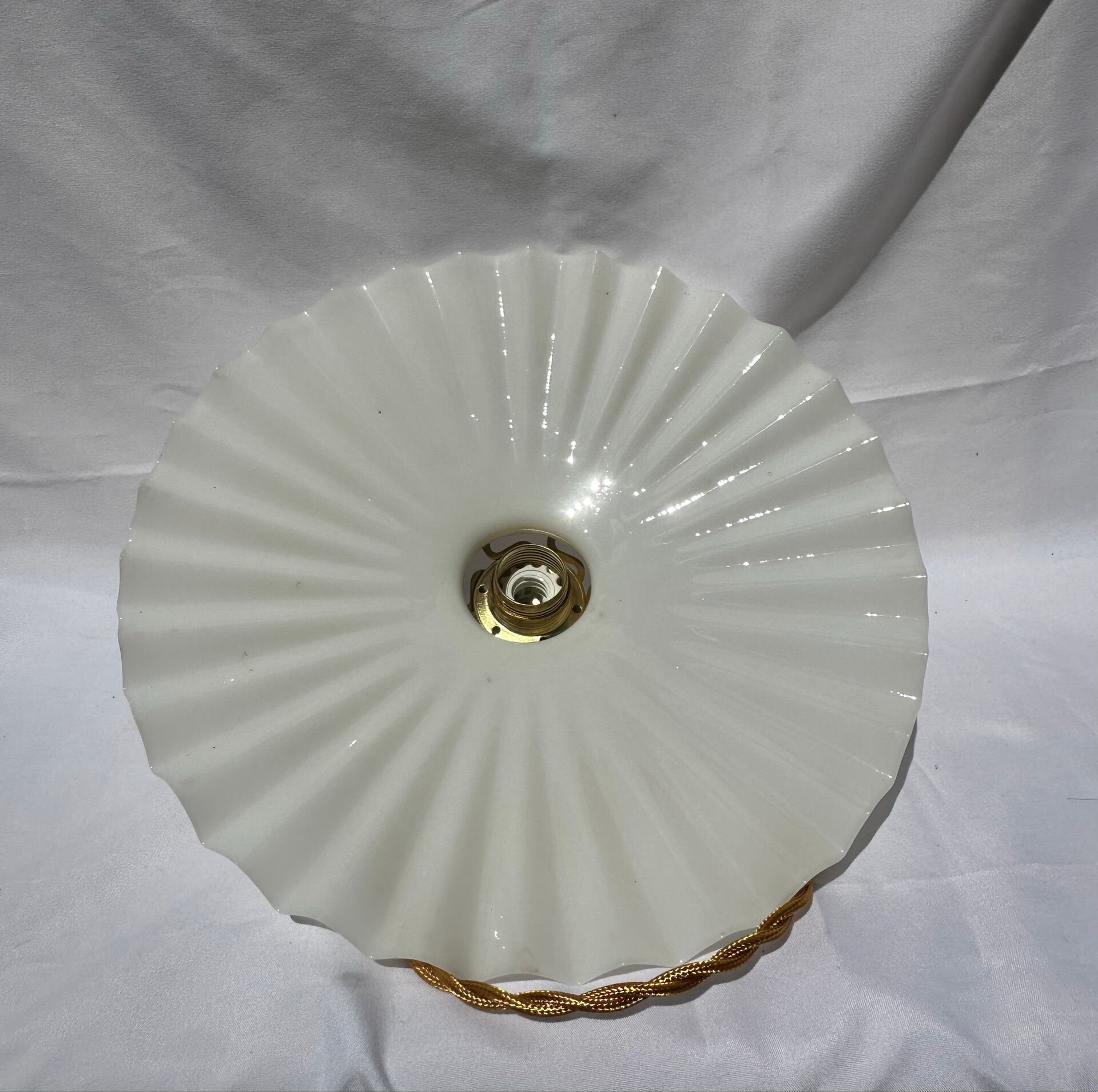 Vintage suspension opaline pleated lampshade with golden threads and claw socket.