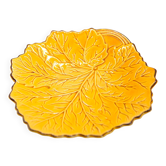 Yellow leaf plate and gilding in slip from Poet Laval