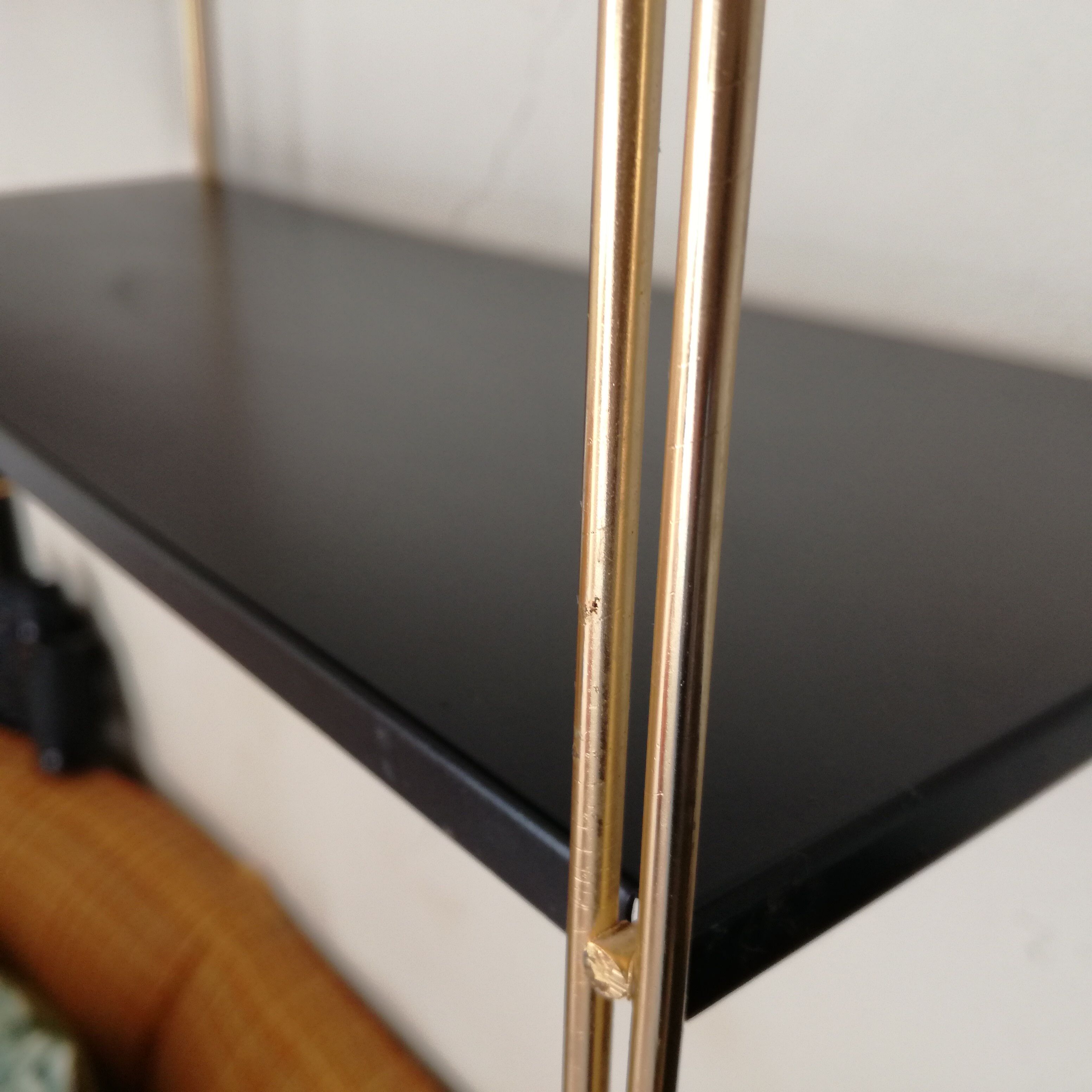 Gold and black thong shelf