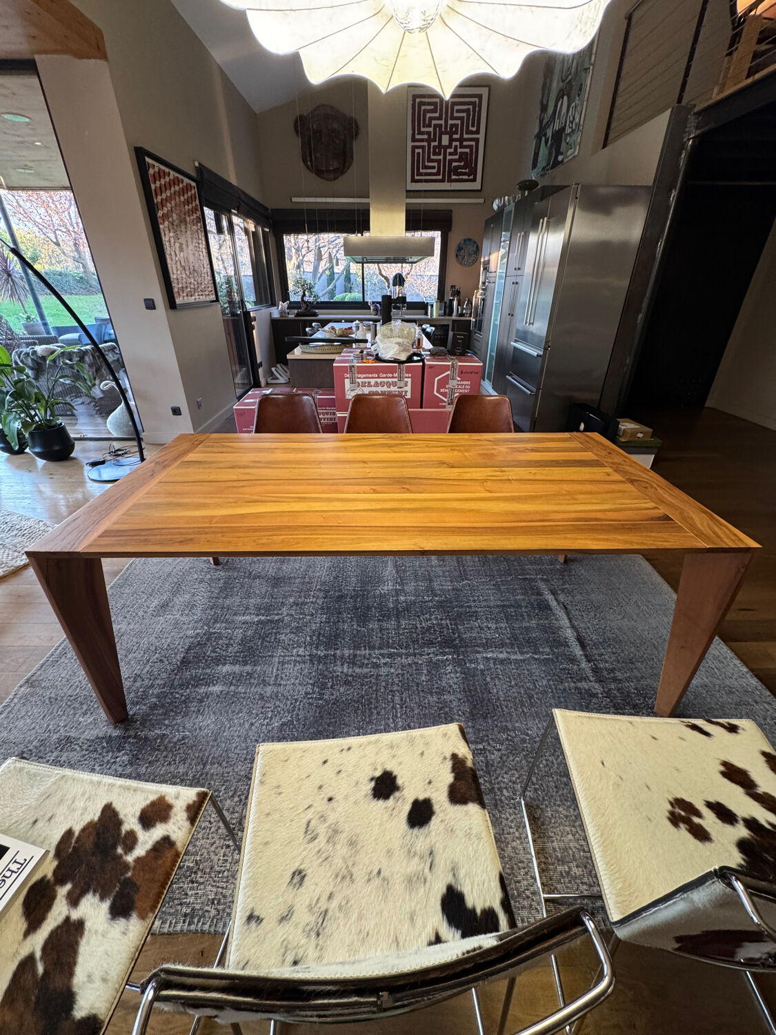 Dining table ligne roset model trapèze in solid walnut with oil finish.