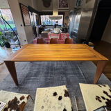 Dining table ligne roset model trapèze in solid walnut with oil finish.
