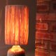 White and brown ceramic lamp, raffia shade