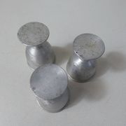 3 old aluminum shells