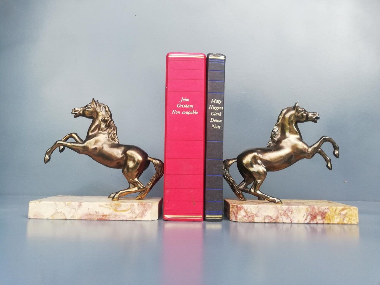 Pair of art deco bookends in bronze and marble