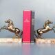 Pair of art deco bookends in bronze and marble