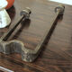 Brutalist wrought iron candle holder beaten