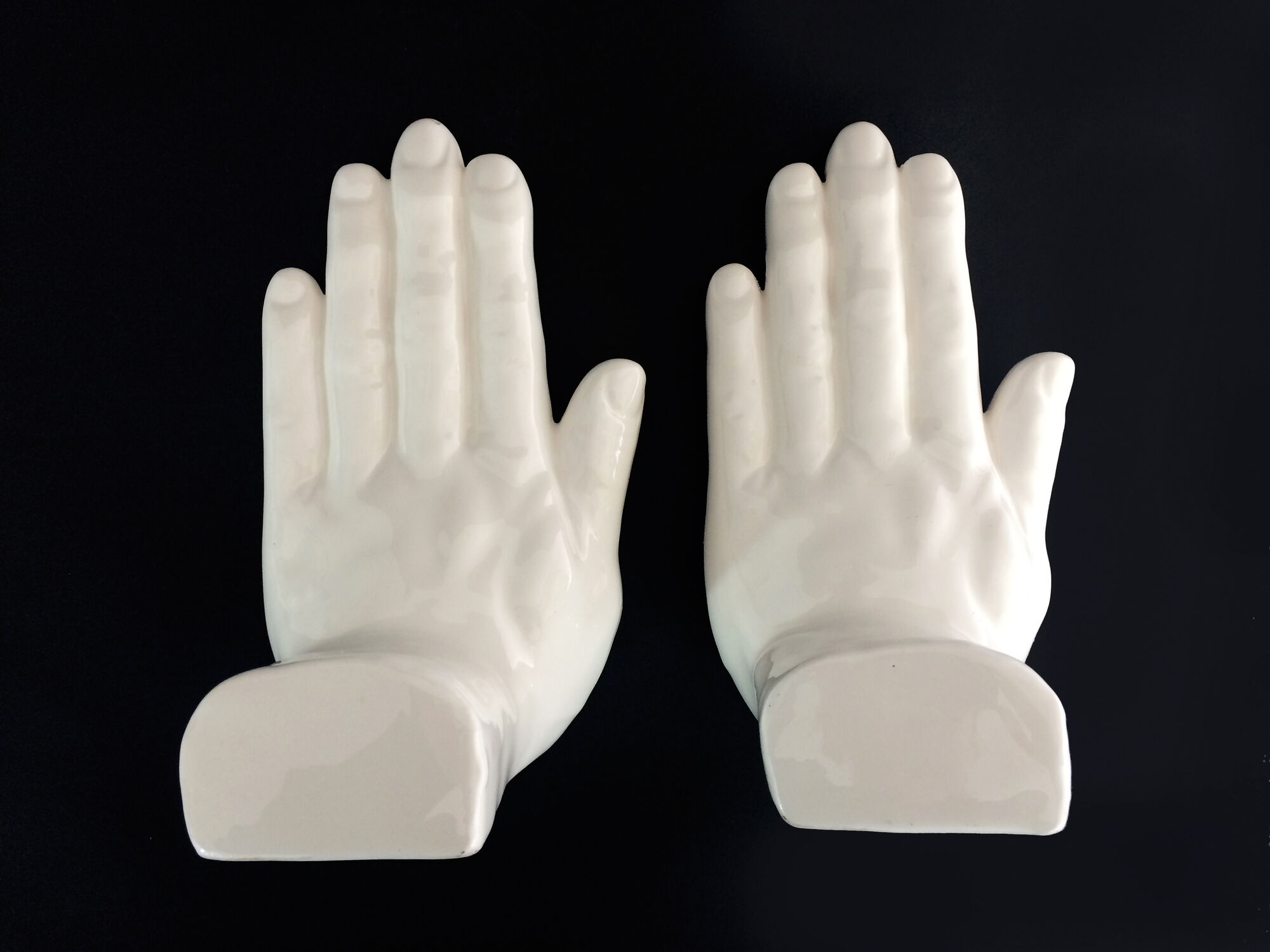 Pair of vintage handends in white ceramic to be used to comfort. Year 80