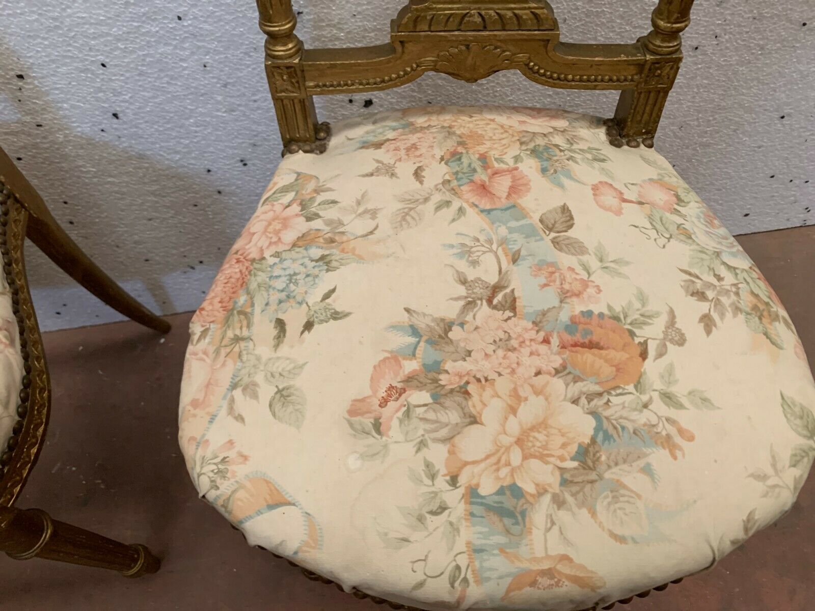 Pair of Louis XVI style chairs in 20th century gilded wood