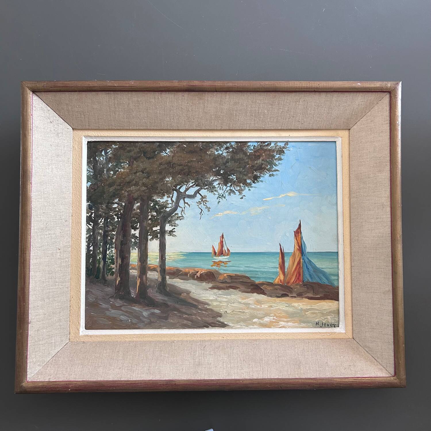 Painting of sailboats on the coast