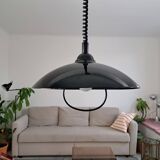 Vintage pendant light goes up and down