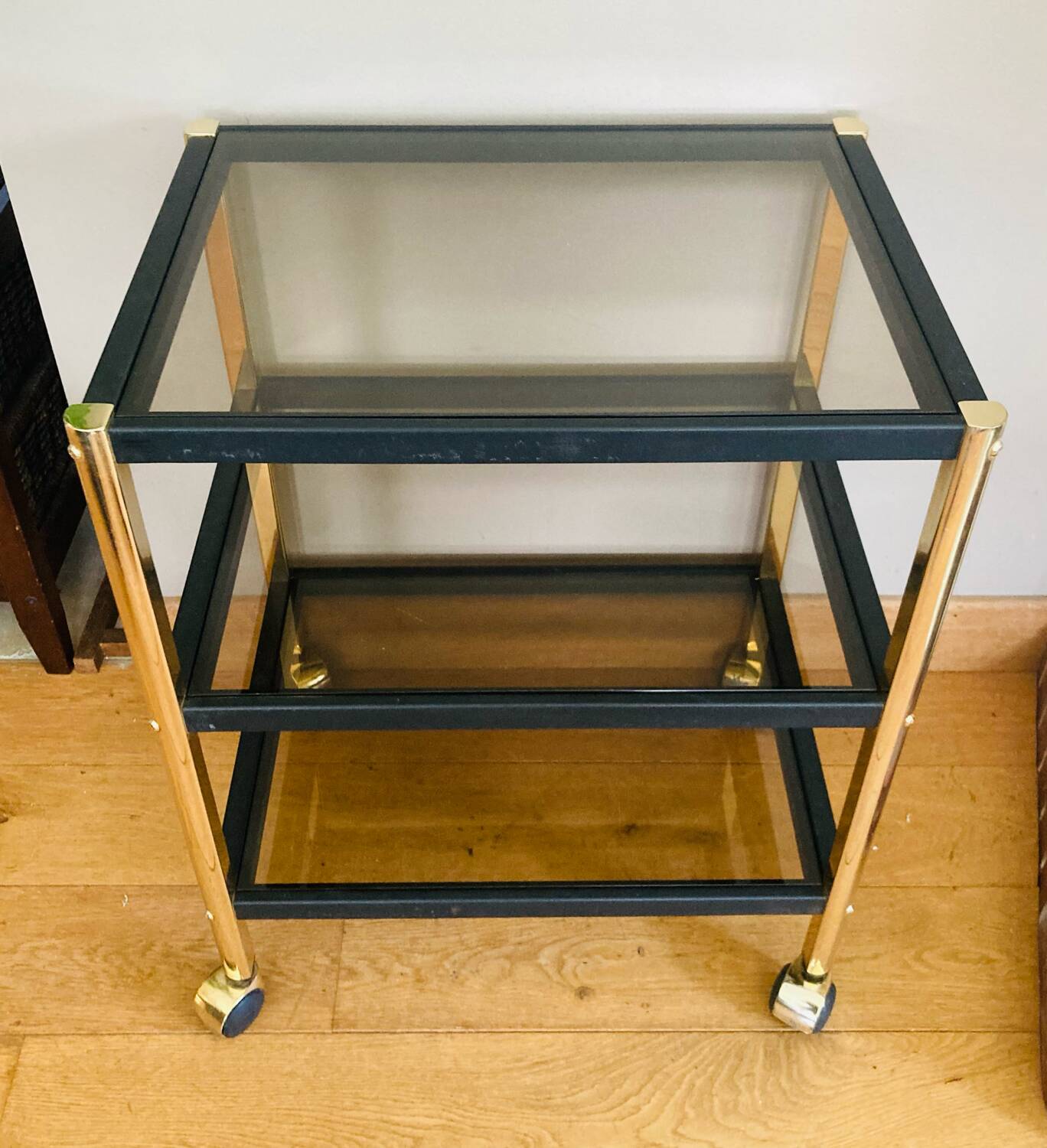 Side table in gold metal and smoked glasses 1970s