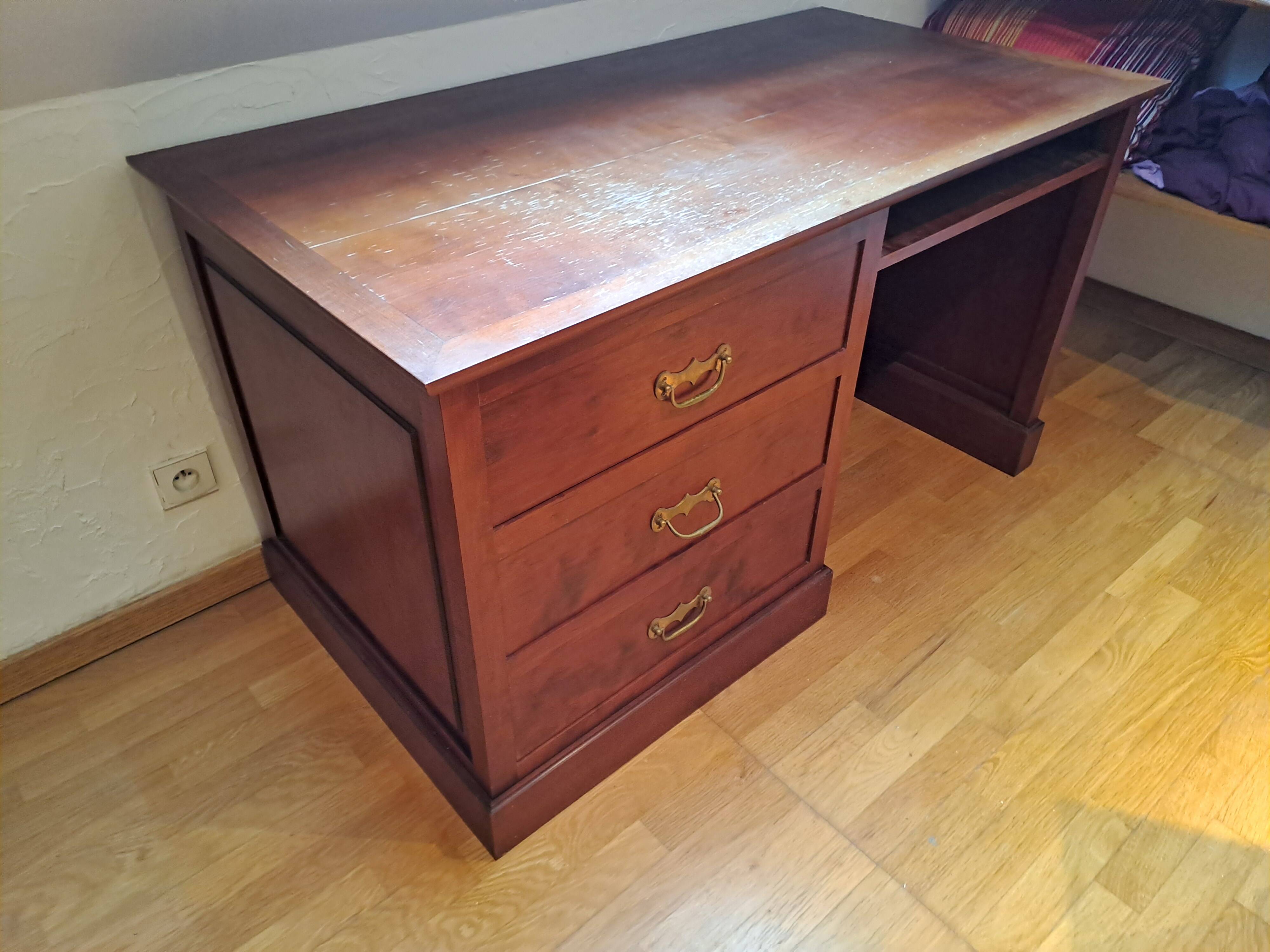 Solid cherry wood desk with 1 block and 3 drawers.