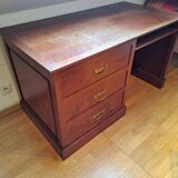 Solid cherry wood desk with 1 block and 3 drawers.