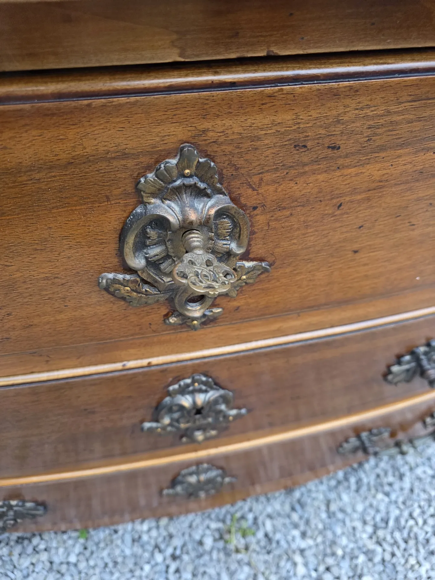 Curved Louis XV style chest of drawers in solid walnut