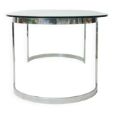 Dining table with a circular base.