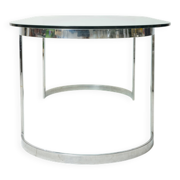 Dining table with a circular base.