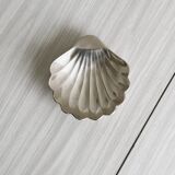 Silver metal shell emptier