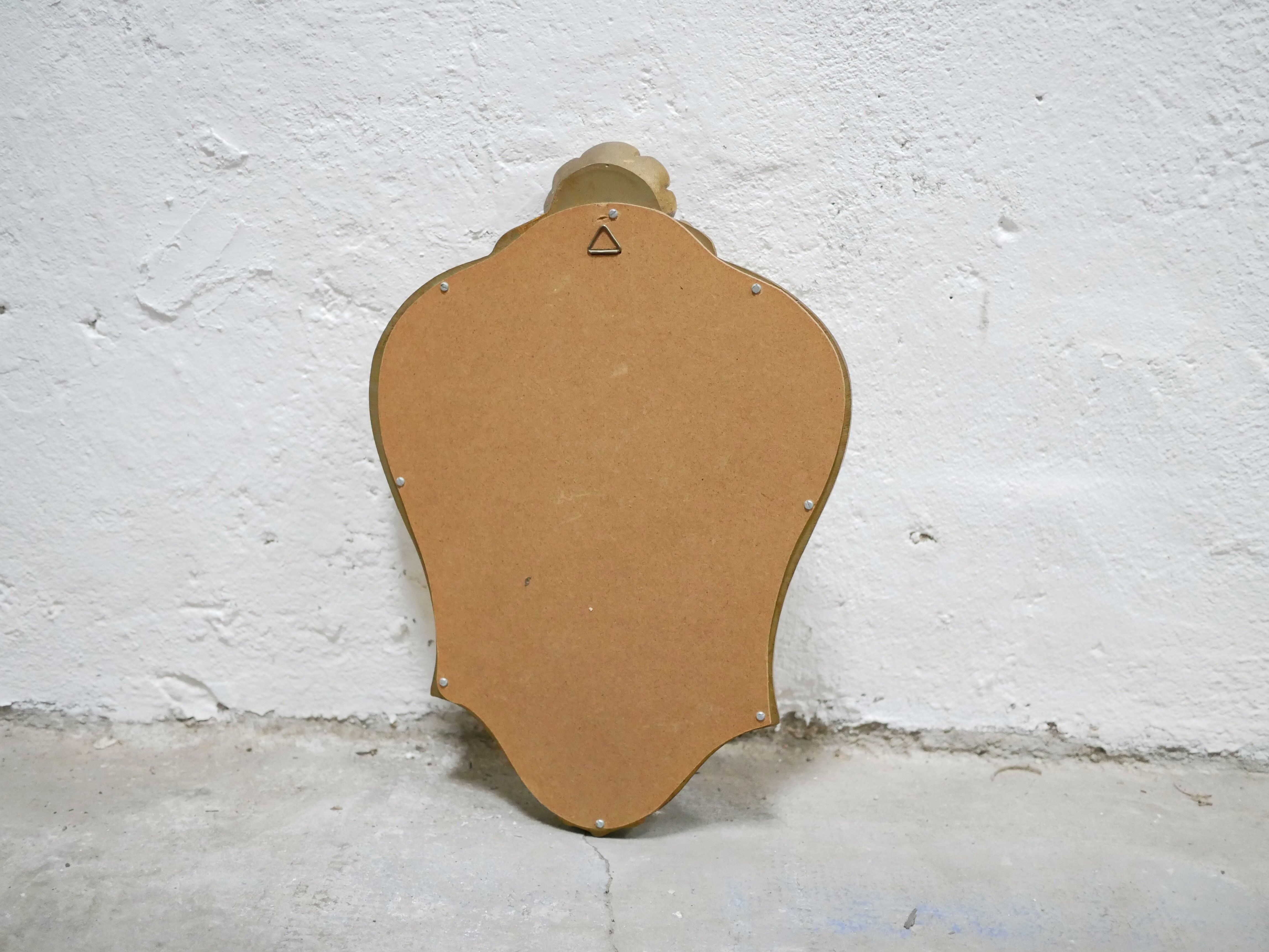 Miroir vintage de style baroque en bois doré