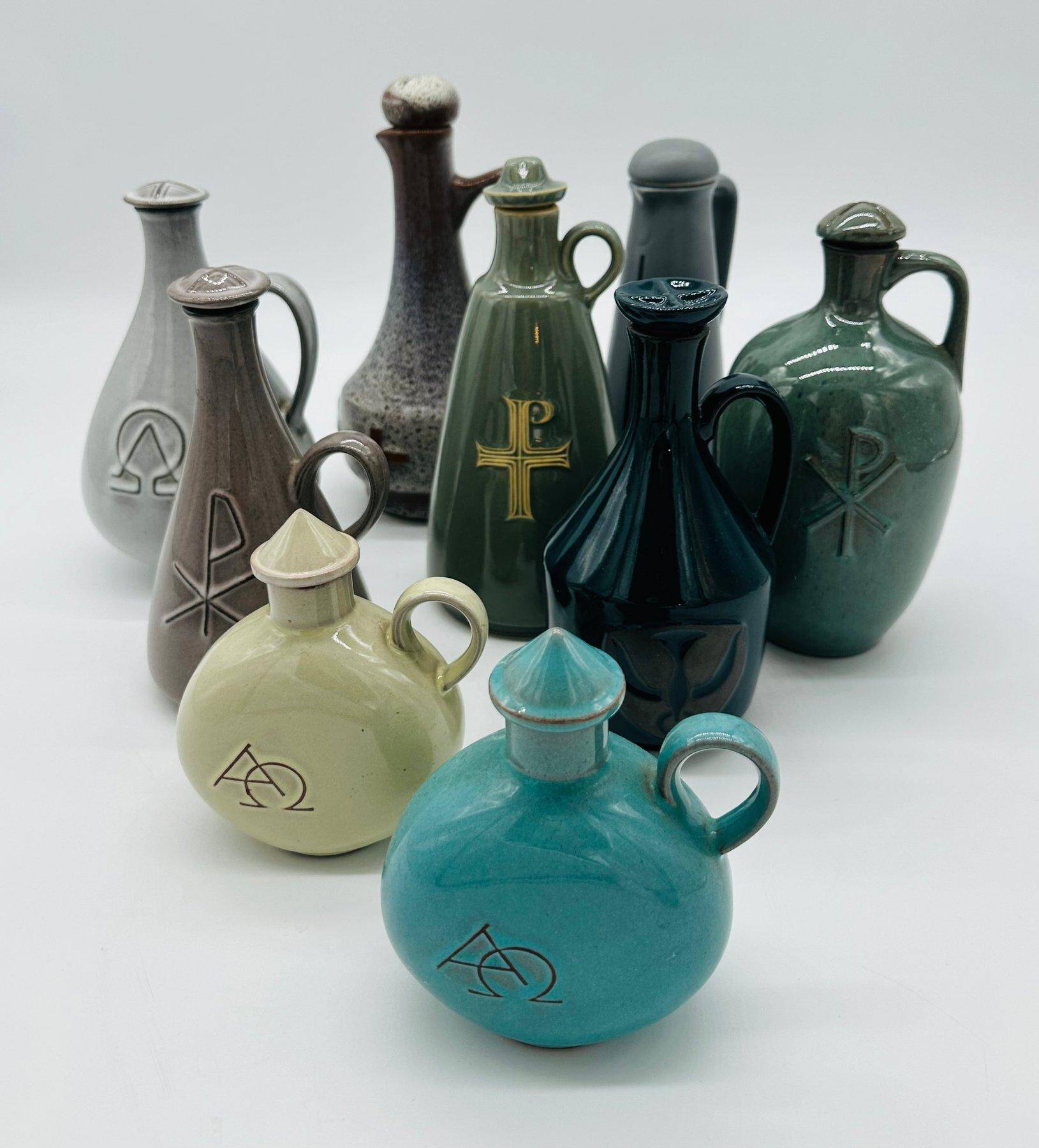 Set of nine modern sculptural ceramic vases from the mid-century, Bauhaus influence.