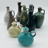 Set of nine modern sculptural ceramic vases from the mid-century, Bauhaus influence.