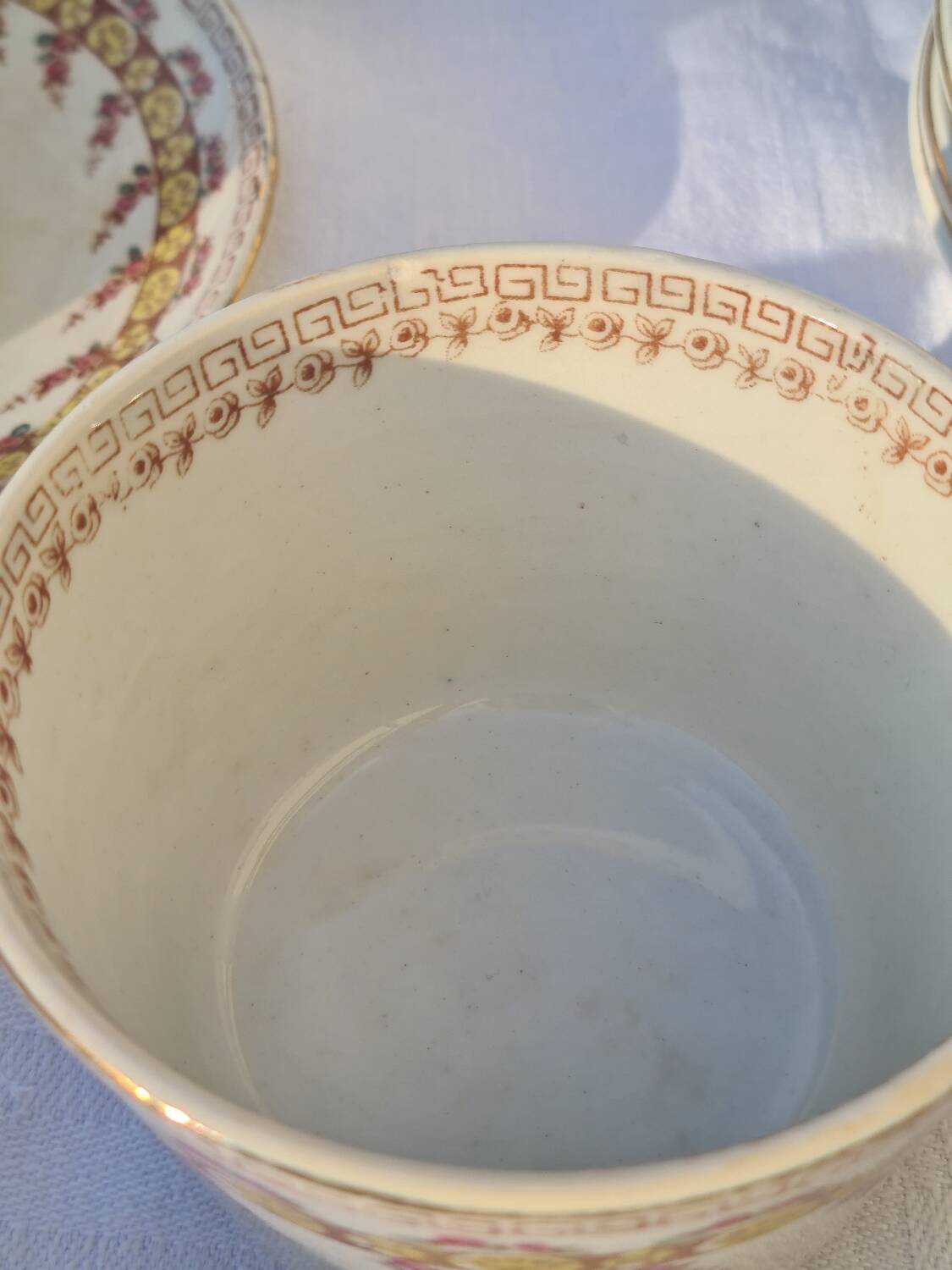 Gien opaque porcelain cups from the early 20th century